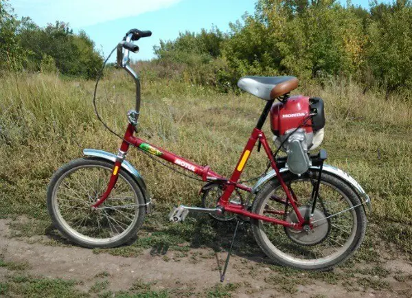 bicicletta con motore trimmer